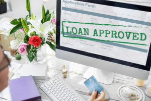 Computer screen showing "loan approved" to illustrate Acorn.finance & Acorn.mortgage being successful in applications
